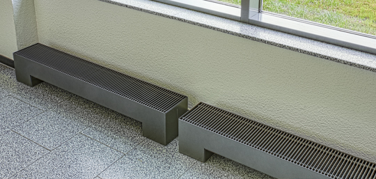Free-standing convector with electric heating coil